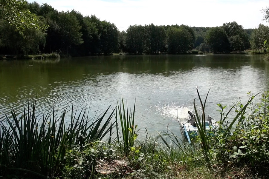 View of pump at Etang de Azat-Chatenet carp fishing lake in France