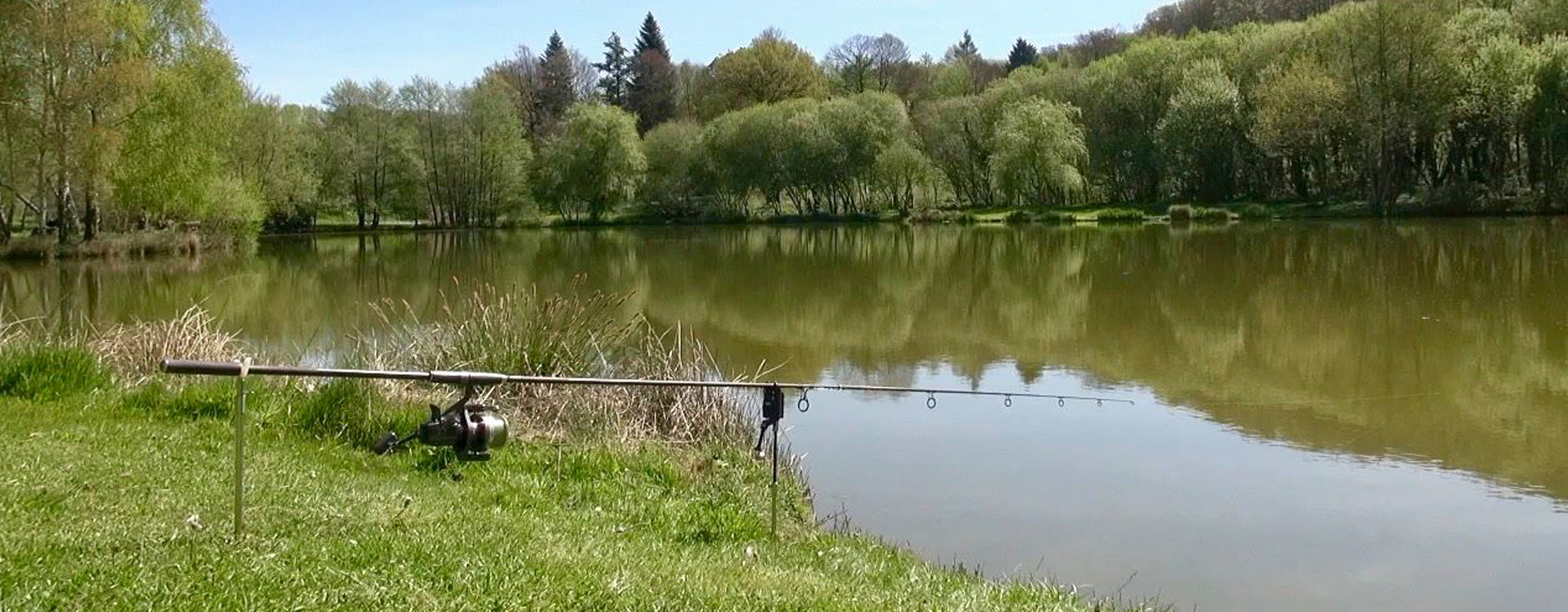 Fishing rod ready for carp fishing at Etang de Azat-Chatenet lake in France