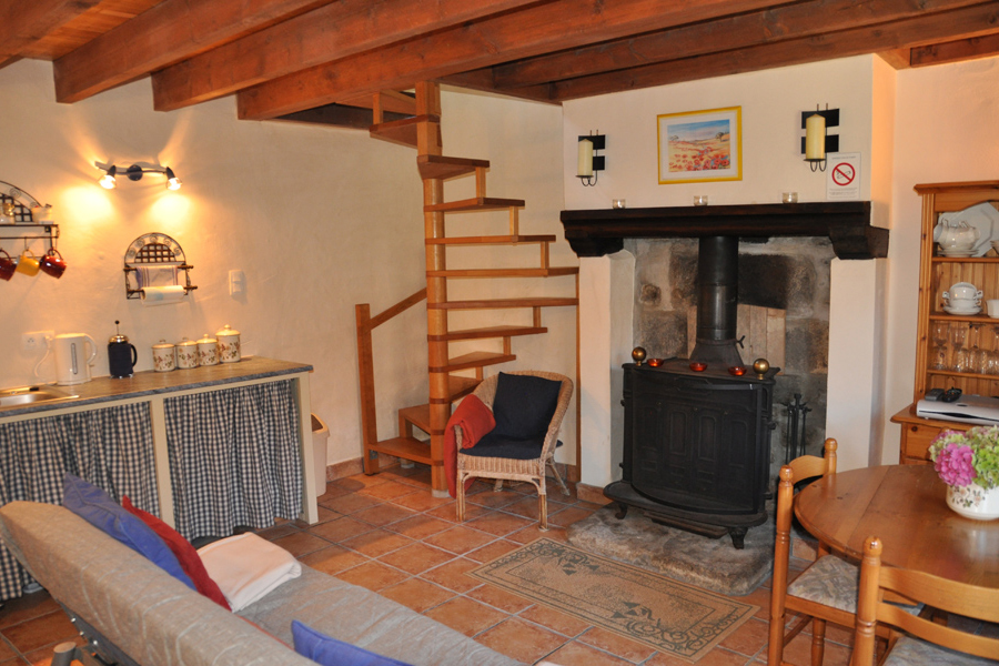 French holiday cottage kitchen diner with wood burner Etang de Azat-Chatenet Creuse France