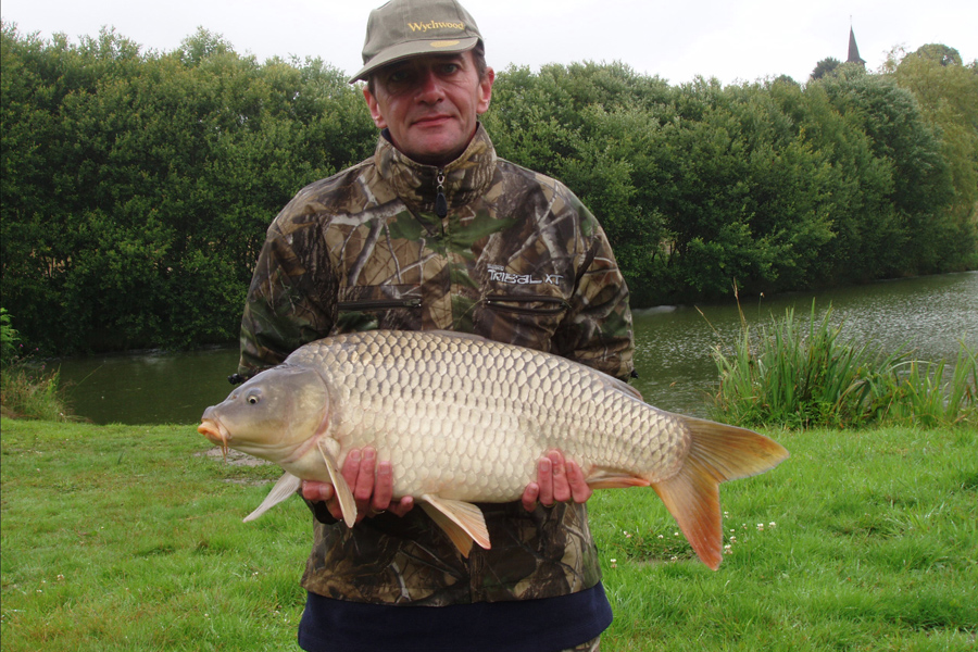 Common carp caught at Etang de Azat-Chatenet fishing lake in France