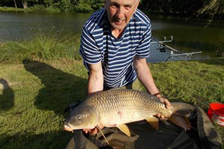 Common carp caught at Etang de Azat-Chatenet fishing lake in France