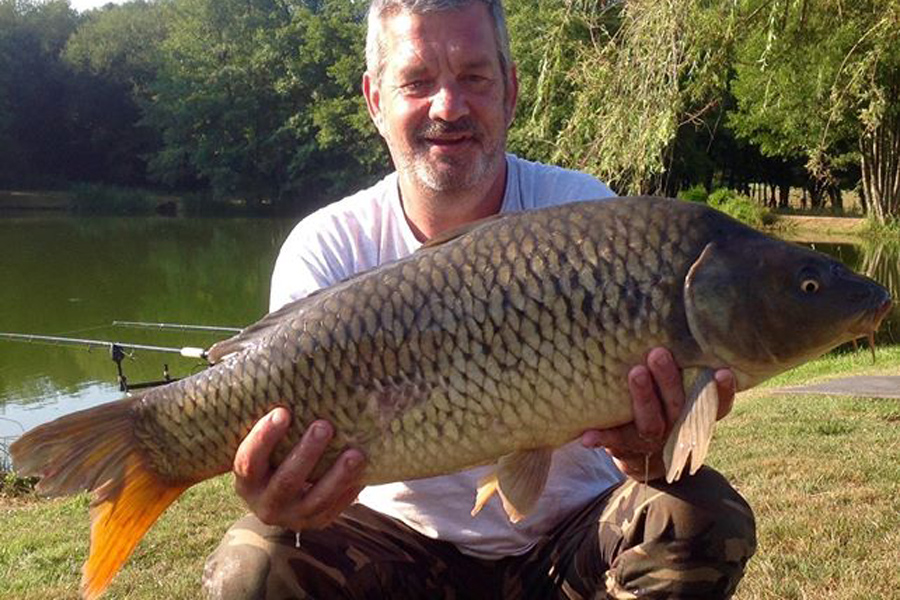 Common carp caught at Etang de Azat-Chatenet fishing lake in France