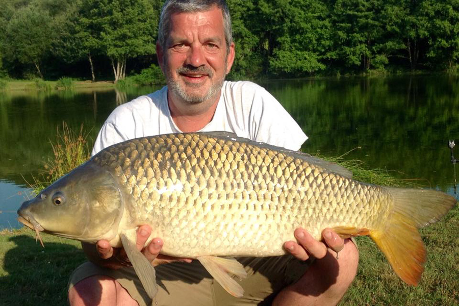 Common carp caught at Etang de Azat-Chatenet fishing lake in France