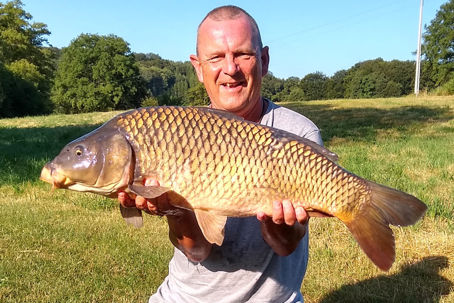 Common carp caught at Etang de Azat-Chatenet fishing lake in France