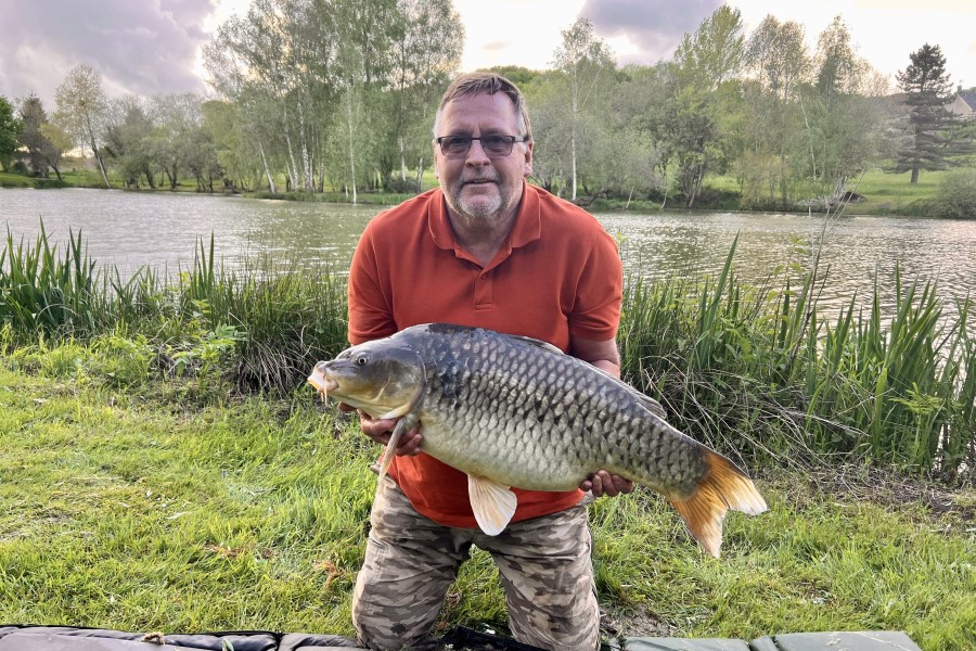 Common carp caught at Etang de Azat-Chatenet fishing lake in France