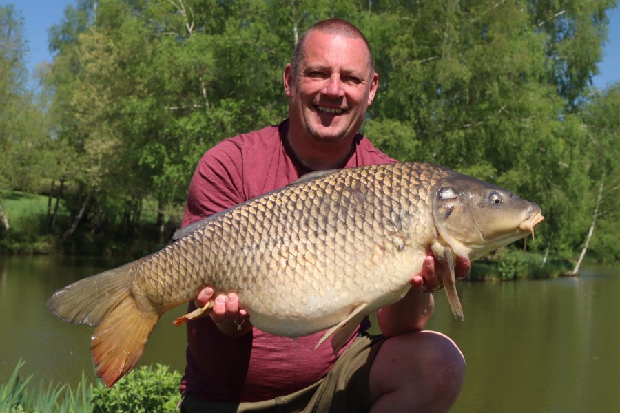 Common carp caught at Etang de Azat-Chatenet fishing lake in France