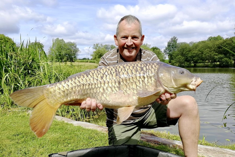 Common carp caught at Etang de Azat-Chatenet fishing lake in France