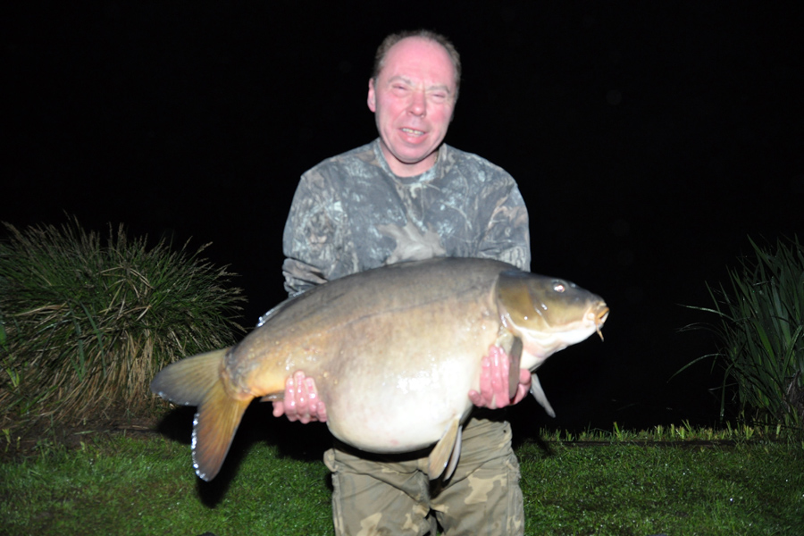 Lake record holder for 50lb 12oz mirror carp caught at Etang de Azat-Chatenet fishing lake in France