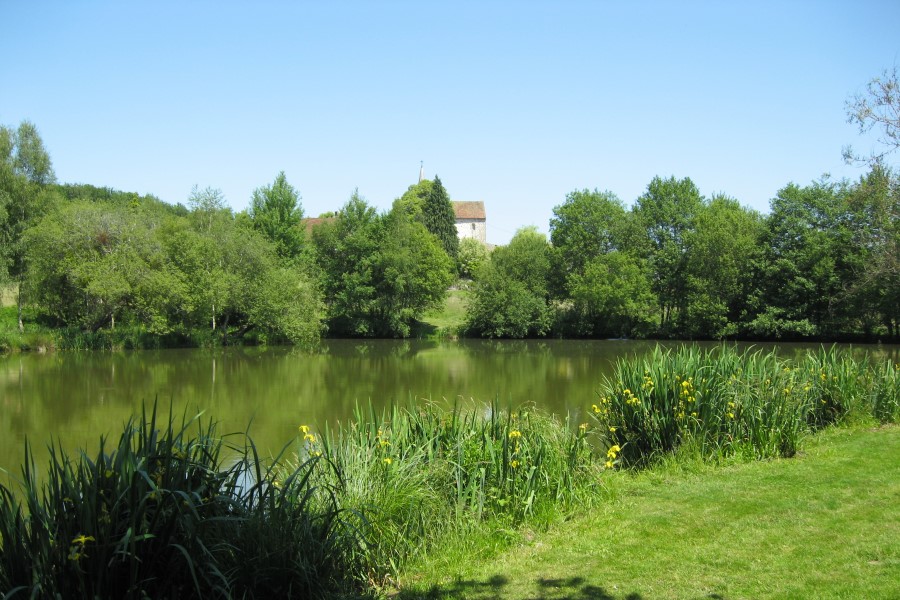 Lake and grounds at Etang de Azat-Chatenet fishing lake in France