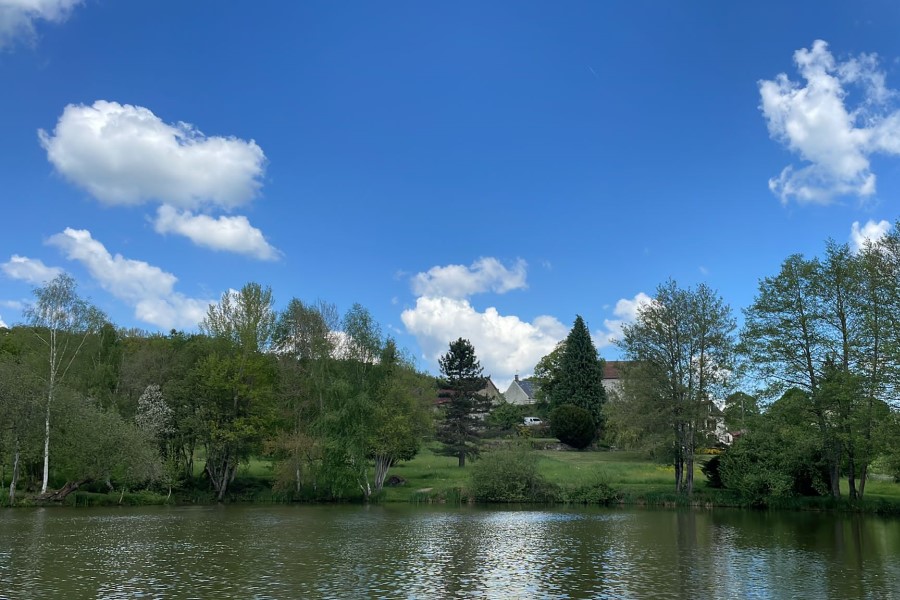 Lake and grounds at Etang de Azat-Chatenet fishing lake in France