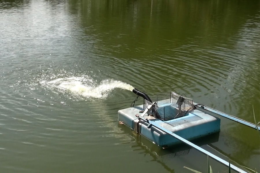 Close up of pump at Etang de Azat-Chatenet carp fishing lake in France